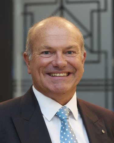 A headshot of John Hillson