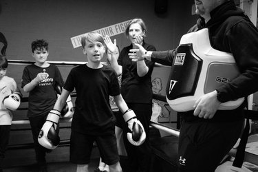 A child participates at a local boxing club.