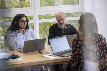 Staff at Letchworth Garden City Heritage Foundation having a meeting