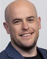 A headshot of Sean Prendergast