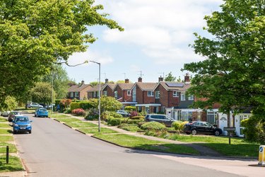 A street of Letchworth houses with front lawns