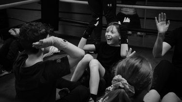 A young person taking part in GRIT’s boxing gym based resilience building activities