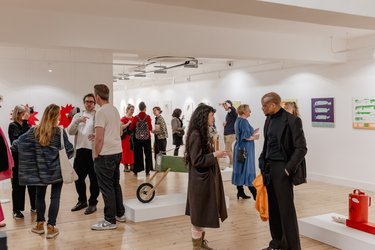 Lots of people gathered at Broadway Gallery for the opening of an art exhibition