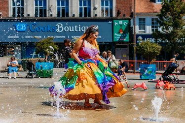 A party princess dances in Letchworth town centre at a community event