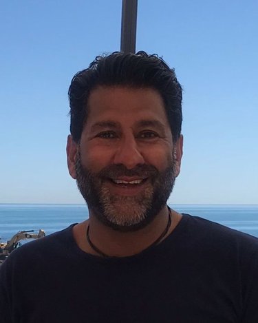 Headshot of Mick Johal